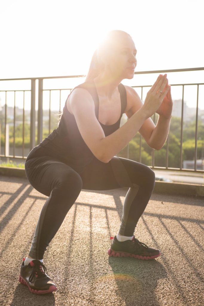 Squat Pomuskeltraining Frau